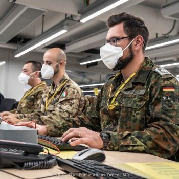 Multinational staff at work during STJA22