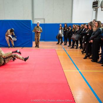 University Students assist to a Military Combat Method training